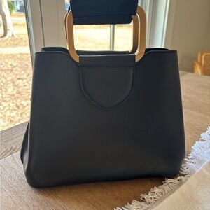 Elegant Black Handbag with Gold Accents